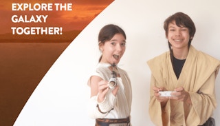 kids in star wars costume playing with helicopter