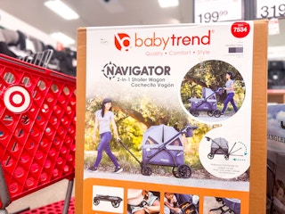 baby trend stroller wagon sitting in front of a target cart