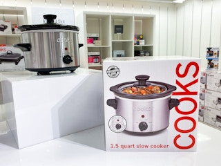 Cooks slow cooker on shelf