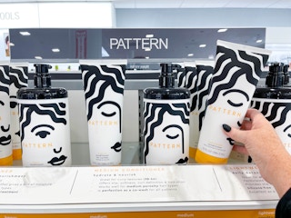 pattern hair products being held