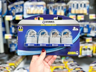 hand holding the Brinks padlocks