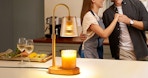 a candle warmer lamp on a kitchen counter