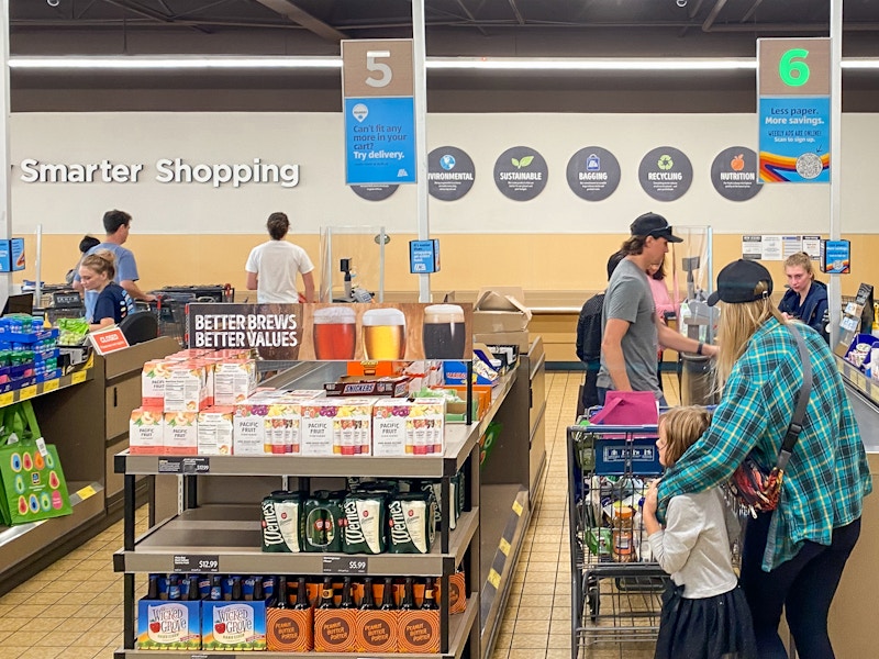 Customers in the checkout lane at Aldi