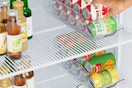 soda can organizers in a fridge