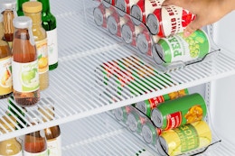 soda can organizers in a fridge