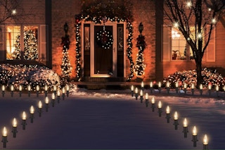 pathway lights in front on decorated house