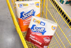scott toilet paper and paper towels in yellow shopping cart