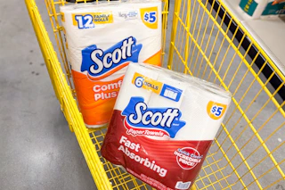 scott toilet paper and paper towels in yellow shopping cart
