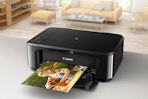a printer printing a picture on a table 