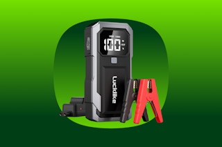A car jump starter with two clips to go on the battery, one is red, one is black, digital display