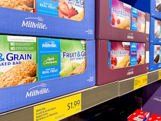 variety of millville fruit and grain soft-baked bars with price on aldi store shelf