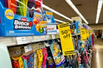 50% off clearance signs in a summer aisle with toys and water balloons