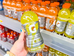 hand holding a gatorade sports drink