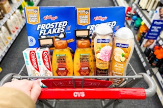 frosted flakes, toothpaste, body wash, shampoo, and eyeshadow in a cart