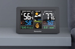 a digital weather station on a table