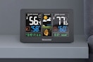 a digital weather station on a table