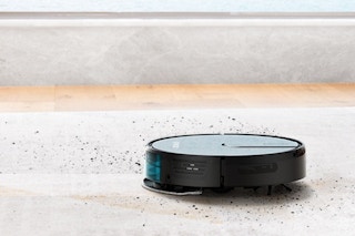 a robot vacuum mop on carpet