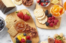 Cutting boards with meat and cheese.