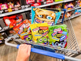 4 bags of assorted candy from Butterfinger in a Walmart shopping cart