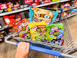 4 bags of assorted candy from Butterfinger in a Walmart shopping cart