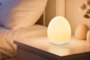 an egg night light on a nightstand 