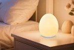 an egg night light on a nightstand