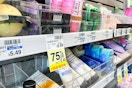 shelves at cvs with 75% off clearance signs