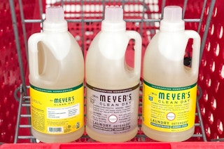 three bottles of Mrs Meyer's detergent in a shopping cart
