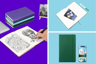 A hand draws in a notebook; a pile of 4 notebooks sits nearby. The notebook is laying flat. The notebook is next to a smartphone for size.