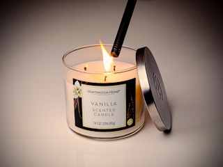 Aldi candle being lit with a lighter