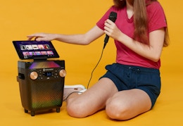 person using the singing machine