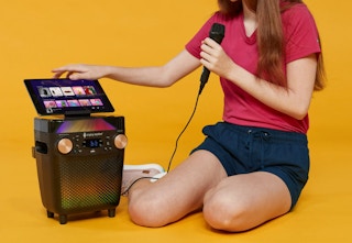 person using the singing machine
