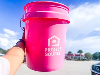 Project Source pink 5-gallon bucket held up outdoors 