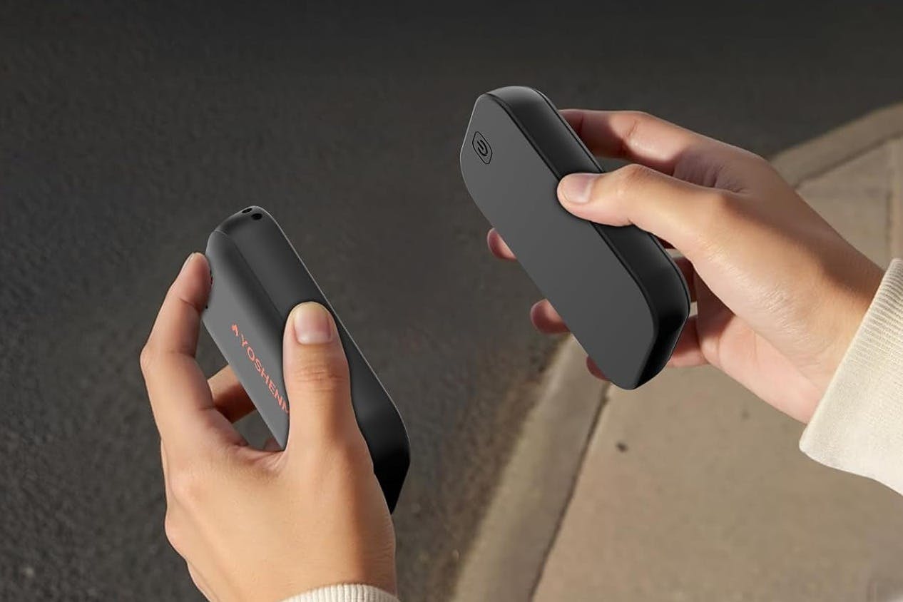 a woman holding hand warmers