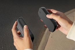 a woman holding hand warmers