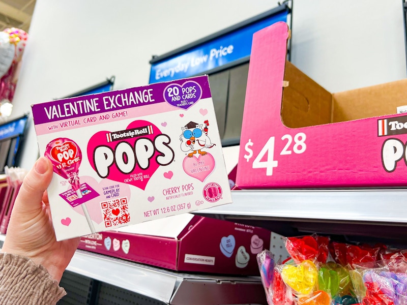 hand holding valentine exchange pops at walmart