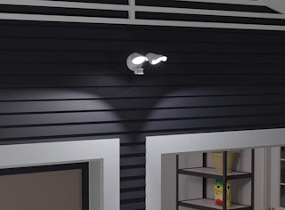 outdoor sensor light on a house over a garage