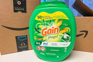 Gain Flings next to Amazon boxes