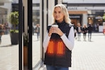 a woman wearing a heated vest