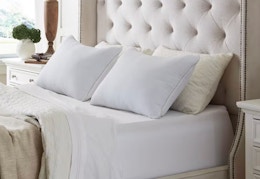 two king pillows on a bed