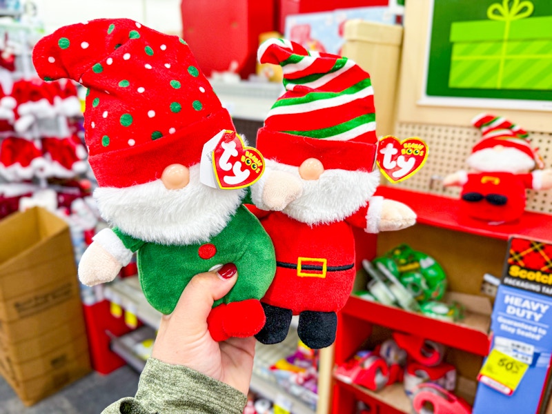 hand holding 2 ty christmas beanie boos plushes