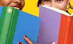 Lifestyle image of 2 people with books up to their face