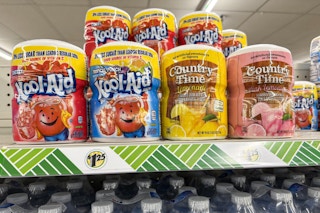 country time lemonade and kool-aid drink mixes on a dollar tree shelf