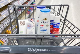 a walgreens cart with dove body wash, crest kids toothpaste, crest premium toothpaste, bulldog skincare, oral-b toothbrushes