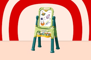 A green plastic art easel with a chalk board on one side, a dry-erase board on the other side, and a place to hang paper.
