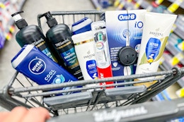 nivea body wash, tresemme shampoo, pantene shampoo, oral-b electric toothbrush, and colgate toothbrush in a cart