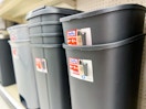 hefty trash cans sitting on a target shelf