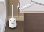 an electric toilet brush in a bathroom 