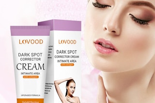 A woman next to a dark spot corrector cream