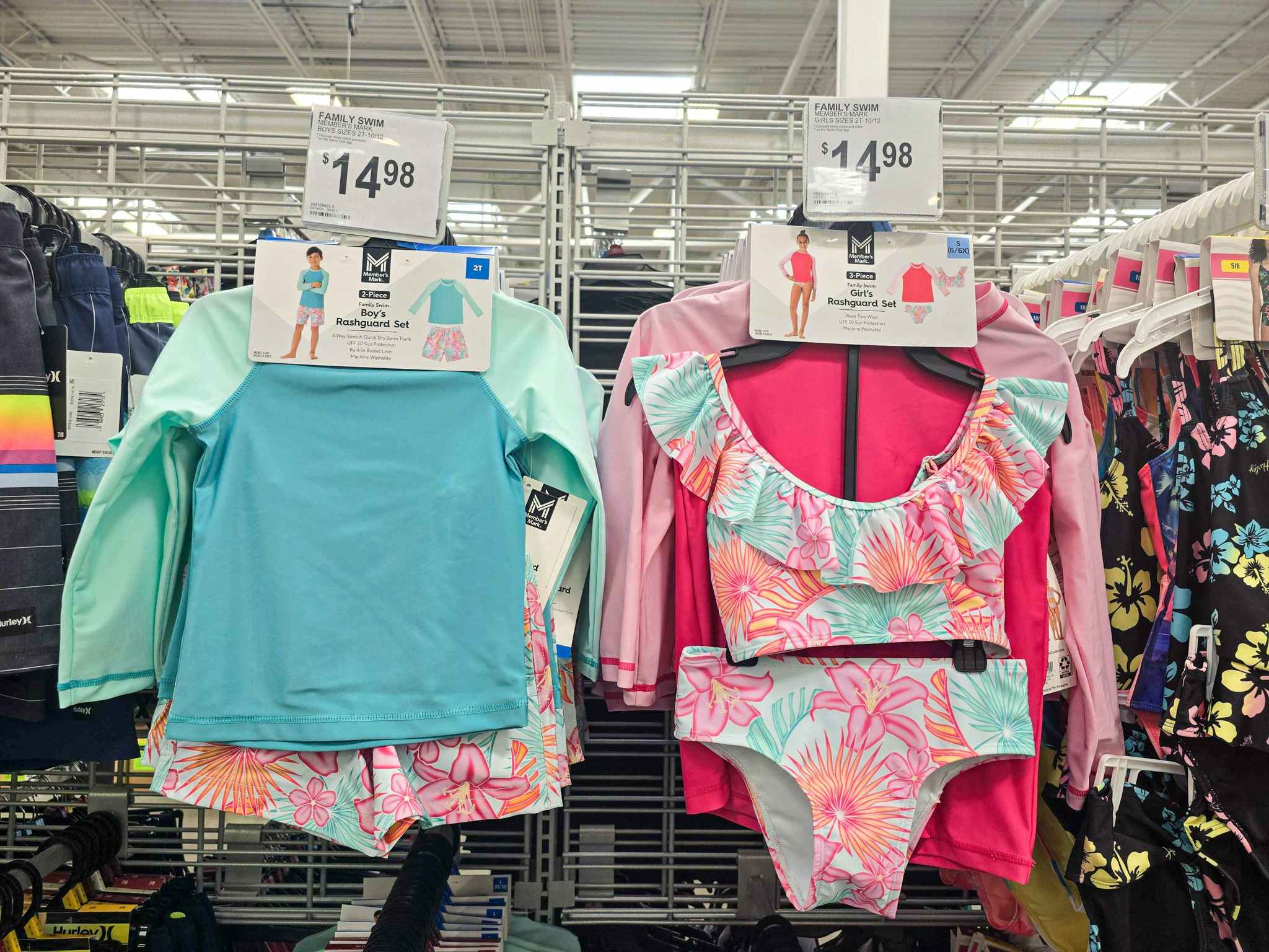 matching kids swimwear sets hanging up on display